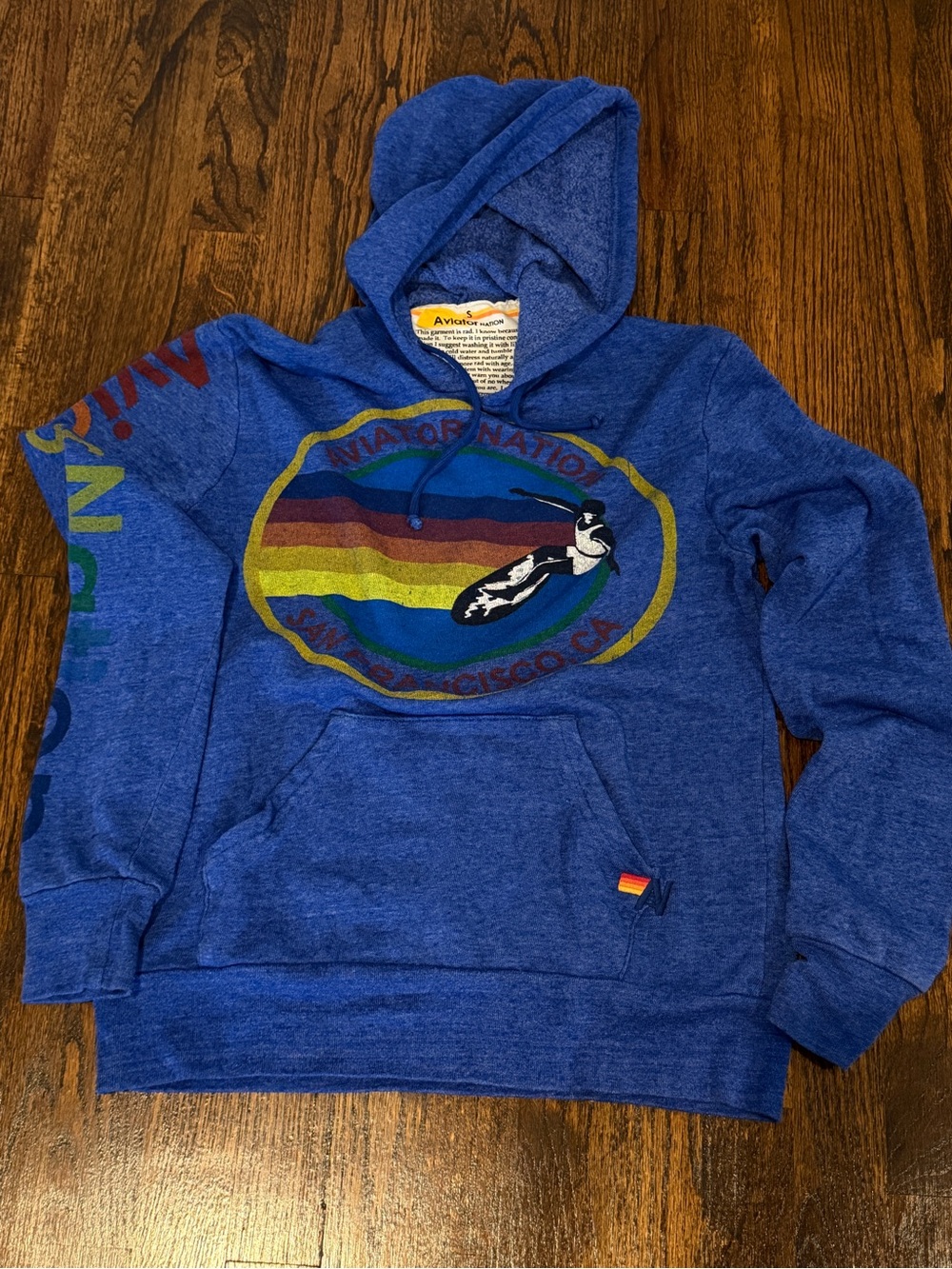 Aviator Nation Blue Pullover Hoodie with Rainbow Graphic